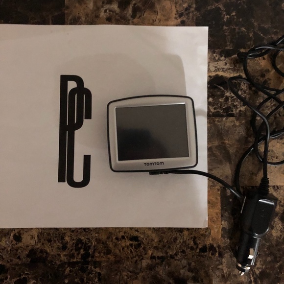 Tom Tom Touchscreen GPS Navigation System - Picture 1 of 3